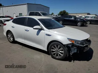 2018 Kia Optima S with VIN 5XXGT4L31JG229693, listed as a Copart auction lot 60841225 with 63,739 mi miles and Salvage title. Bid and sale history available at DreamBid. Image 4.