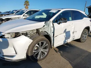 2022 Lexus RX with VIN 2T2HGMDA8NC074588, listed as a IAAI auction lot 41828234 with 106,845 mi miles. Bid and sale history available at carsss.com. Image 6.