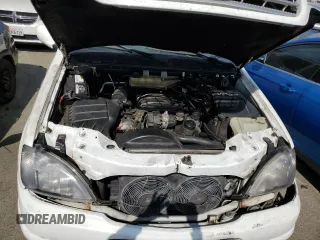2000 Mercedes-Benz M-Class with VIN 4JGAB54E5YA165660, listed as a Copart auction lot 65872364 with 115,668 mi miles and Salvage Title. Bid and sale history available at carsss.com. Image 12.
