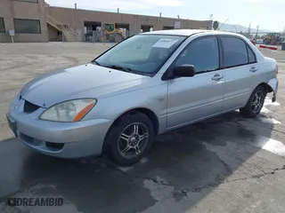 2004 Mitsubishi Lancer ES with VIN JA3AJ26E54U052124, listed as a IAAI auction lot 41804473 with 165,786 mi miles. Bid and sale history available at carsss.com. Image 2.