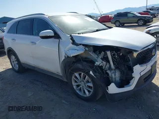 2017 Kia Sorento LX z VIN 5XYPGDA56HG191084, wystawiony jako IAAI lot #42087432 z przebiegiem 74 159 mil mil oraz . Historia ofert i sprzedaży dostępna na DreamBid. Obrazek 1.