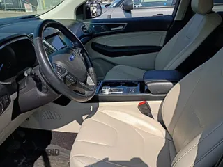 2019 Ford Edge Titanium with VIN 2FMPK4K91KBC09840, listed as a IAAI auction lot 42870883 with 118,778 mi miles and . Bid and sale history available at DreamBid. Image 33.