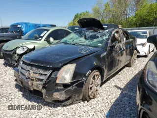 2010 Cadillac CTS Premium z VIN 1G6DS5EV1A0140012, wystawiony jako Copart lot #52329095 z przebiegiem Nie podano mil oraz Nie do naprawy • Non repairable. Historia ofert i sprzedaży dostępna na DreamBid. Obrazek 1.