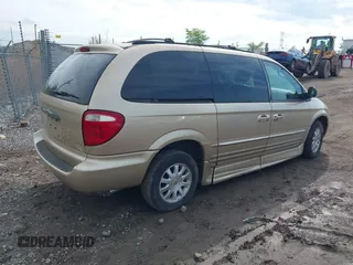 2001 Chrysler Town & Country LXi with VIN 2C8GP54L81R374793, listed as a IAAI auction lot 42150259 with 134,591 mi miles and . Bid and sale history available at DreamBid. Image 4.