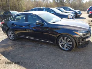 2018 Genesis G80 3.8L with VIN KMHGN4JE0JU265072, listed as a IAAI auction lot 41596549 with 121,502 mi miles. Bid and sale history available at carsss.com. Image 13.