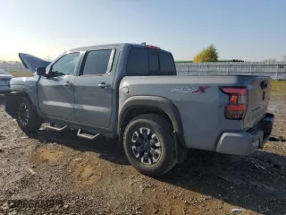 2022 Nissan Frontier PRO-X with VIN 1N6ED1EJ8NN609619, listed as a Copart auction lot 86608994 with 76,078 mi miles and Salvage Title. Bid and sale history available at carsss.com. Image 2.