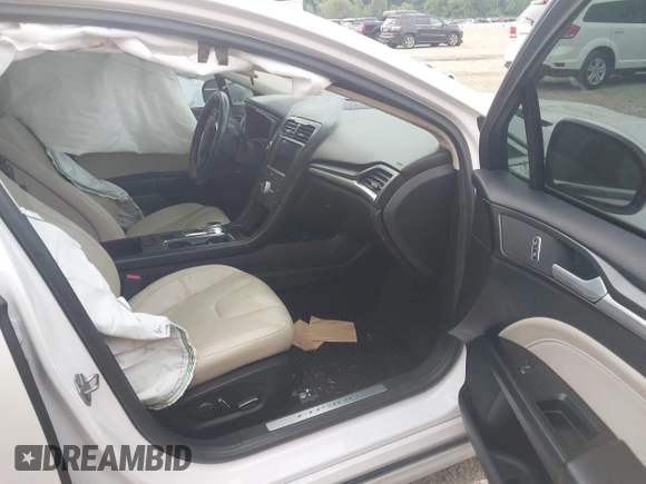 2017 Ford Fusion Titanium with VIN 3FA6P0D96HR239830, listed as a IAAI auction lot 42741998 with 116,951 mi miles and . Bid and sale history available at DreamBid. Image 5.