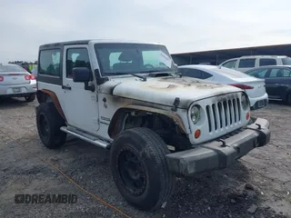 2012 Jeep Wrangler Sport with VIN 1C4AJWAG4CL214606, listed as a IAAI auction lot 42054857 with Not provided miles and . Bid and sale history available at DreamBid. Image 1.