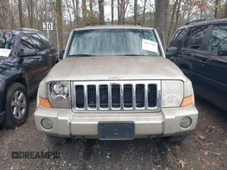 2007 Jeep Commander Sport z VIN 1J8HG48P47C672667, wystawiony jako IAAI lot #40423450 z przebiegiem 230 823 mil mil oraz . Historia ofert i sprzedaży dostępna na DreamBid. Obrazek 6.