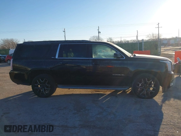 2015 GMC Yukon XL SLT with VIN 1GKS1HKC3FR250207, listed as a IAAI auction lot 41424234 with 183,233 mi miles. Bid and sale history available at carsss.com. Image 13.