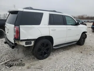 2015 GMC Yukon SLE with VIN 1GKS2AKCXFR107100, listed as a Copart auction lot 47050165 with 135,345 mi miles and Clean Title. Bid and sale history available at carsss.com. Image 3.