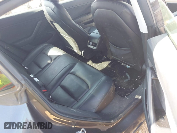 2019 Tesla Model 3 Long Range with VIN 5YJ3E1EB2KF510398, listed as a IAAI auction lot 42067654 with 108,971 mi miles and . Bid and sale history available at DreamBid. Image 8.