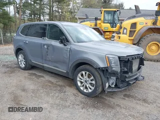 2022 Kia Telluride LX z VIN 5XYP24HC9NG219104, wystawiony jako IAAI lot #42026163 z przebiegiem 82 002 mil mil oraz . Historia ofert i sprzedaży dostępna na DreamBid. Obrazek 1.