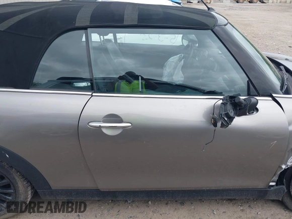 2017 MINI Convertible Cooper S with VIN WMWWG9C34H3C81035, listed as a IAAI auction lot 42216900 with 61,996 mi miles and . Bid and sale history available at DreamBid. Image 13.