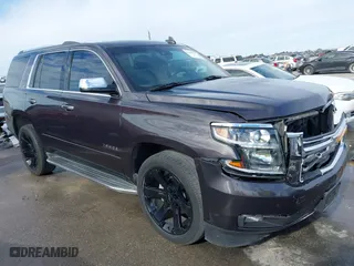 2015 Chevrolet Tahoe LTZ with VIN 1GNSCCKC8FR617540, listed as a IAAI auction lot 41356342 with 118,268 mi miles. Bid and sale history available at carsss.com. Image 1.