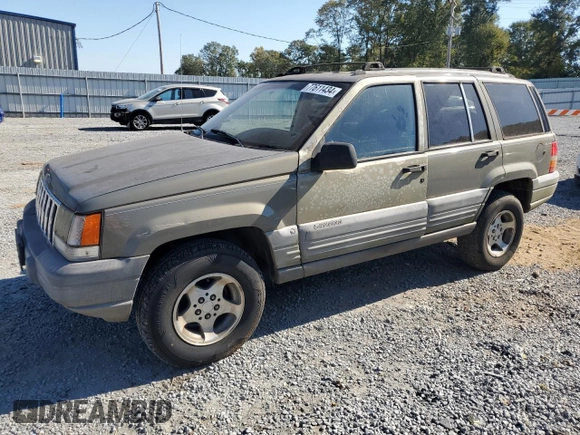 1998 Jeep Grand Cherokee Laredo with VIN 1J4GZ58S5WC165213, listed as a Copart auction lot 77611434 with 168,688 mi miles and Salvage Title. Bid and sale history available at carsss.com. Image 1.