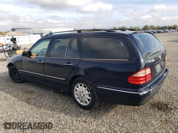 2001 Mercedes-Benz E-Class with VIN WDBJH65JX1B387291, listed as a Copart auction lot 79756824 with 261,205 mi miles and Salvage Title. Bid and sale history available at carsss.com. Image 2.