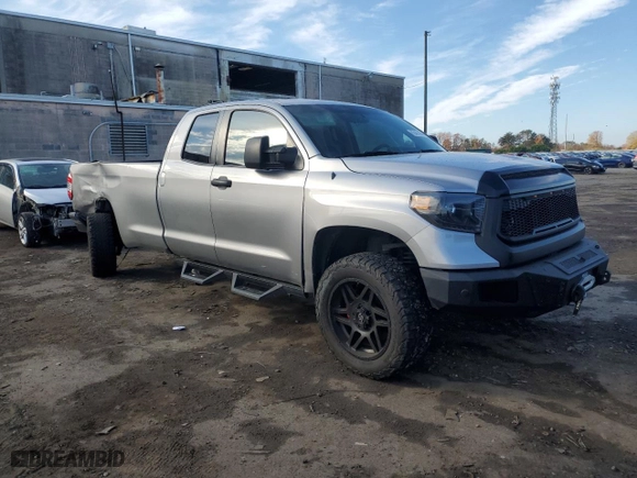 2014 Toyota Tundra 4WD Truck SR with VIN 5TFCY5F11EX016449, listed as a Copart auction lot 82401484 with 216,310 mi miles and Salvage Title. Bid and sale history available at carsss.com. Image 4.