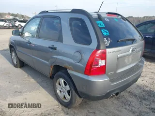 2010 Kia Sportage LX with VIN KNDKGCA36A7710107, listed as a IAAI auction lot 41846066 with 144,662 mi miles and . Bid and sale history available at carsss.com. Image 3.