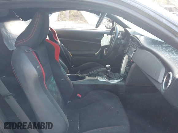 2015 Scion FR-S with VIN JF1ZNAA10F8707671, listed as a IAAI auction lot 42000130 with 136,734 mi miles. Bid and sale history available at carsss.com. Image 5.
