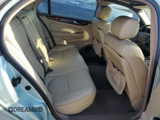2005 Jaguar XJ with VIN SAJWA79C15SG48962, listed as a Copart auction lot 75674034 with 0 mi miles and Salvage Title. Bid and sale history available at carsss.com. Image 10.