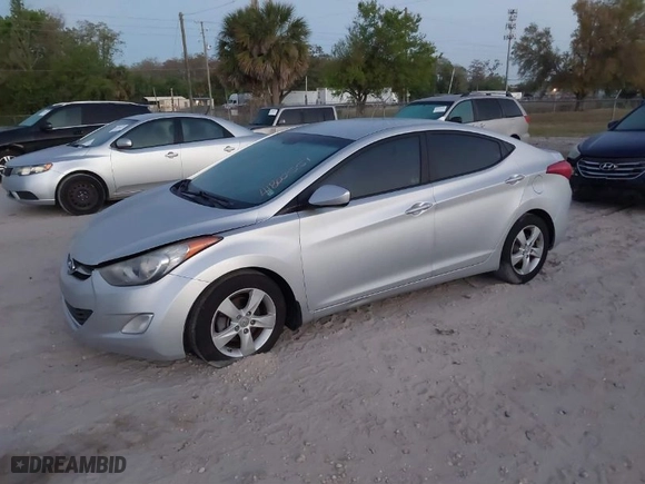 2013 Hyundai Elantra Limited PZEV with VIN 5NPDH4AE7DH352285, listed as a IAAI auction lot 41800551 with 120,171 mi miles. Bid and sale history available at carsss.com. Image 2.
