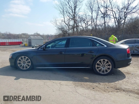2012 Audi A8 L with VIN WAURVAFD7CN004673, listed as a IAAI auction lot 41768222 with 108,982 mi miles. Bid and sale history available at carsss.com. Image 15.