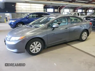 2012 Honda Civic LX z VIN 2HGFB2F59CH313357, wystawiony jako Copart lot #59526905 z przebiegiem 253 322 mil mil oraz Czysty tytuł • Clean title. Historia ofert i sprzedaży dostępna na DreamBid. Obrazek 1.