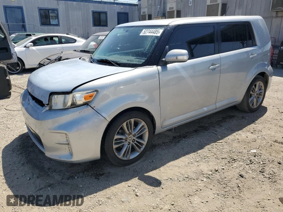 2013 Scion xB with VIN JTLZE4FE5DJ039321, listed as a Copart auction lot 52744485 with 128,536 mi miles and Salvage Title. Bid and sale history available at carsss.com. Image 1.