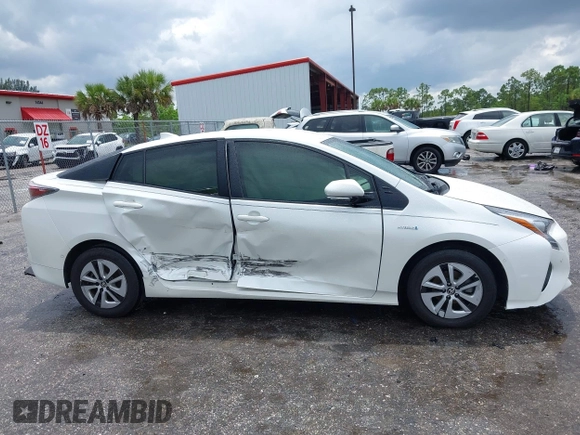 2017 Toyota Prius Two with VIN JTDKBRFU5H3044068, listed as a IAAI auction lot 42462917 with 116,261 mi miles and . Bid and sale history available at DreamBid. Image 13.