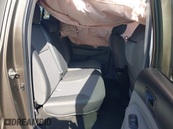 2015 Toyota Tacoma with VIN 3TMMU4FN5FM082376, listed as a IAAI auction lot 42144113 with 98,244 mi miles and . Bid and sale history available at DreamBid. Image 8.