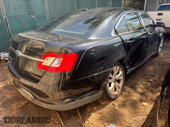 2011 Ford Taurus SEL z VIN 1FAHP2EW8BG138540, wystawiony jako Copart lot #56559815 z przebiegiem 286 211 mil mil oraz Tytuł czysty. Historia ofert i sprzedaży dostępna na DreamBid. Obrazek 4.