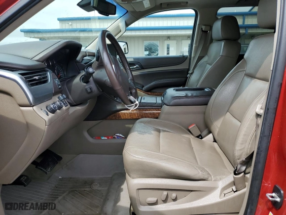 2015 Chevrolet Tahoe LTZ with VIN 1GNSKCKCXFR723104, listed as a Copart auction lot 50660325 with 198,740 mi miles and Salvage Title. Bid and sale history available at carsss.com. Image 7.