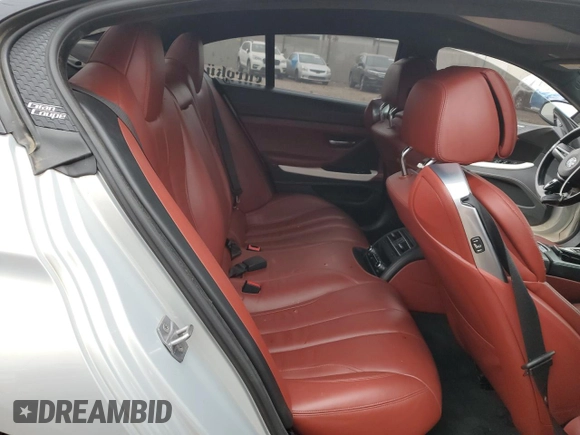 2015 BMW M6 z VIN WBS6C9C55FD467907, wystawiony jako Copart lot #72682374 z przebiegiem 25 841 mil mil oraz Szkoda całkowita • Salvage title. Historia ofert i sprzedaży dostępna na DreamBid. Obrazek 10.
