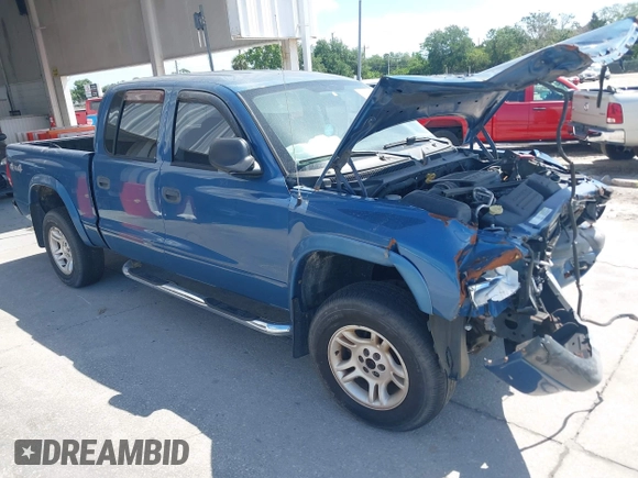 2004 Dodge Dakota Sport z VIN 1D7HG38N84S709758, wystawiony jako IAAI lot #42168491 z przebiegiem 238 479 mil mil oraz . Historia ofert i sprzedaży dostępna na DreamBid. Obrazek 1.