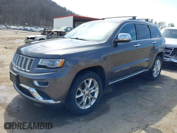 2014 Jeep Grand Cherokee Summit with VIN 1C4RJFJM5EC377129, listed as a IAAI auction lot 41763932 with 187,561 mi miles and . Bid and sale history available at DreamBid. Image 17.