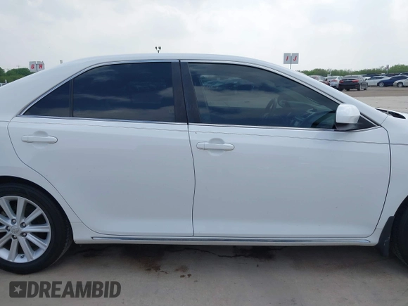 2014 Toyota Camry SE with VIN 4T1BK1FK5EU551196, listed as a IAAI auction lot 41912297 with 104,445 mi miles. Bid and sale history available at carsss.com. Image 13.