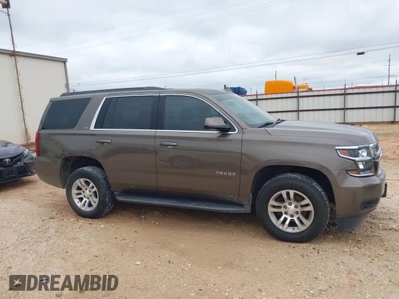 2015 Chevrolet Tahoe LT z VIN 1GNSCBKC2FR685780, wystawiony jako IAAI lot #42354130 z przebiegiem 101 617 mil mil oraz . Historia ofert i sprzedaży dostępna na DreamBid. Obrazek 13.