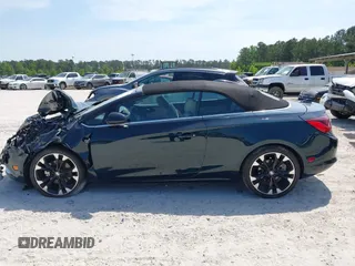 2018 Buick Cascada Sport Touring z VIN W04WJ3N5XJG085431, wystawiony jako IAAI lot #42129756 z przebiegiem 24 364 mil mil oraz . Historia ofert i sprzedaży dostępna na DreamBid. Obrazek 14.