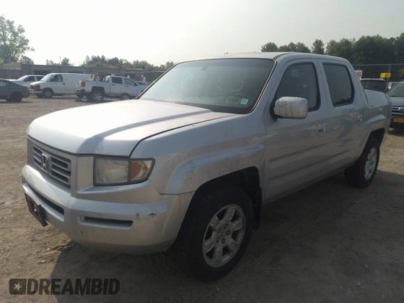 2007 Honda Ridgeline RTL z VIN 2HJYK16537H501200, wystawiony jako IAAI lot #42425662 z przebiegiem 188 618 mil mil oraz . Historia ofert i sprzedaży dostępna na DreamBid. Obrazek 21.