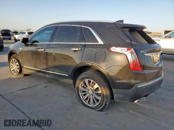 2017 Cadillac XT5 Luxury FWD with VIN 1GYKNBRS9HZ100304, listed as a Copart auction lot 48698755 with 93,407 mi miles and Salvage Title. Bid and sale history available at carsss.com. Image 2.
