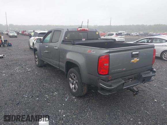 2018 Chevrolet Colorado 4WD Z71 with VIN 1GCGTDEN3J1327344, listed as a IAAI auction lot 42471944 with 153,499 mi miles and . Bid and sale history available at DreamBid. Image 3.