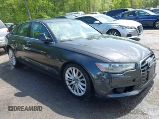 2013 Audi A6 Premium Plus z VIN WAUGFAFC2DN080928, wystawiony jako IAAI lot #42141031 z przebiegiem 162 045 mil mil oraz . Historia ofert i sprzedaży dostępna na DreamBid. Obrazek 1.