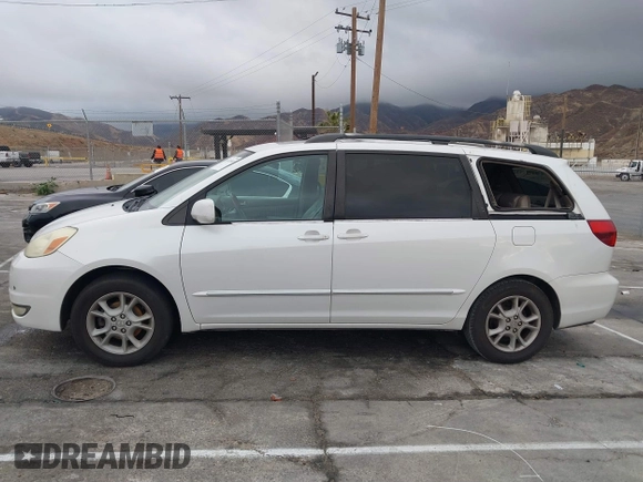 2004 Toyota Sienna XLE with VIN 5TDZA22C94S084569, listed as a IAAI auction lot 41482040 with 210,157 mi miles and . Bid and sale history available at DreamBid. Image 14.