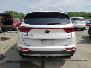 2019 Kia Sportage EX z VIN KNDPNCAC7K7522953, wystawiony jako Copart lot #54906835 z przebiegiem 128 011 mil mil oraz Szkoda całkowita • Salvage title. Historia ofert i sprzedaży dostępna na DreamBid. Obrazek 6.