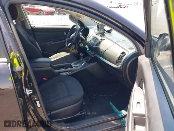 2013 Kia Sportage LX with VIN KNDPBCA25D7449584, listed as a IAAI auction lot 42489414 with 100,993 mi miles and . Bid and sale history available at DreamBid. Image 5.