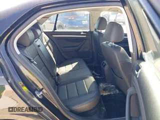 2008 Volkswagen Jetta Sedan Wolfsburg with VIN 3VWRJ71K08M175125, listed as a IAAI auction lot 42087215 with 150,813 mi miles. Bid and sale history available at carsss.com. Image 8.