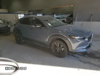 2022 Mazda CX-30 S Carbon Edition с VIN 3MVDMBCL7NM429131, выставлен на аукционе Copart как лот 42421695 с пробегом 21 825 миль миль и Списание • Salvage title. История ставок и продаж доступна на DreamBid. Изображение 4.