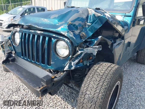 1998 Jeep Wrangler Sport with VIN 1J4FY19S2WP786844, listed as a IAAI auction lot 42382789 with 306,228 mi miles and . Bid and sale history available at DreamBid. Image 6.