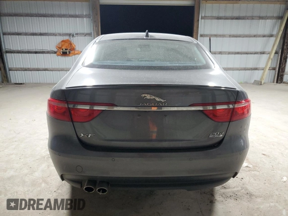 2017 Jaguar XF with VIN SAJBJ4BN3HCY42655, listed as a Copart auction lot 87798165 with 80,700 mi miles and Salvage Title. Bid and sale history available at DreamBid. Image 6.